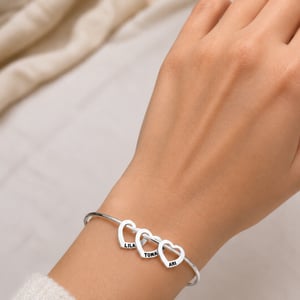 Pulsera Esclava con Dijes Corazón